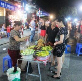 Enjoying Vietnamese street food at night